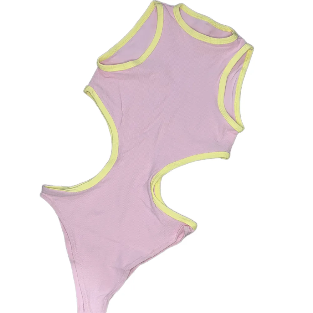 Body rosa baby con sesgo amarillo
